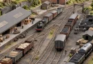 Planning Complex Railway Yard Operations in Compact Scale Layouts